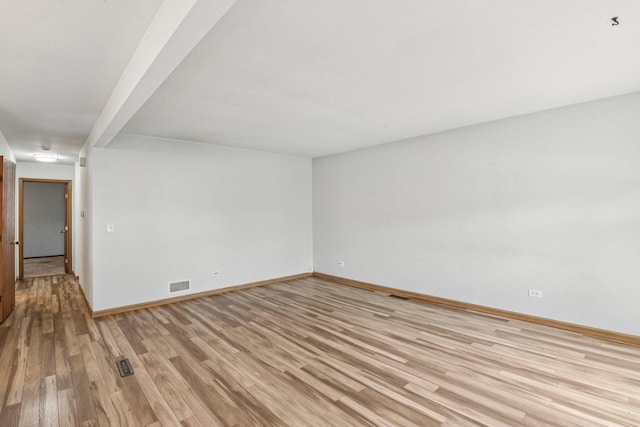 1228 N Lake Shore Dr, Round Lake Beach, IL 60073 - empty room with light wood finished floors and baseboards