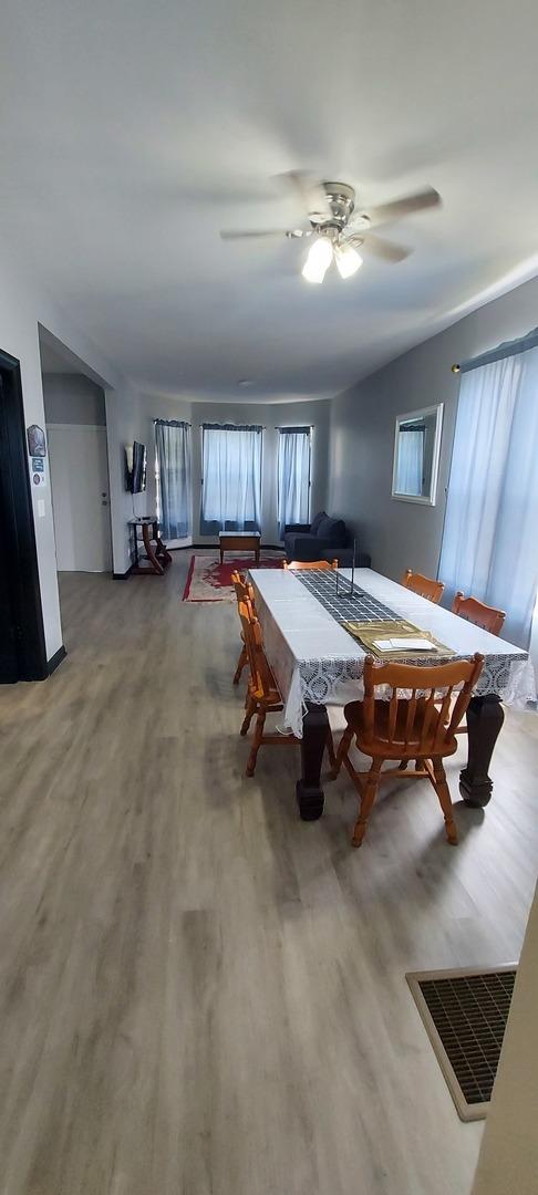 1556 S Spaulding Ave, Chicago, IL 60623 - recreation room featuring wood finished floors and a ceiling fan