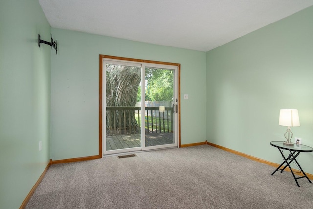 112 NW Adams St N, Hopedale, IL 61747 - carpeted spare room featuring baseboards
