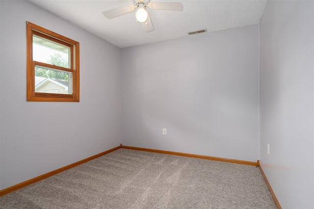 112 NW Adams St N, Hopedale, IL 61747 - carpeted empty room featuring baseboards and ceiling fan
