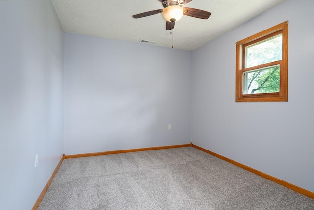 112 NW Adams St N, Hopedale, IL 61747 - carpeted spare room featuring baseboards and a ceiling fan