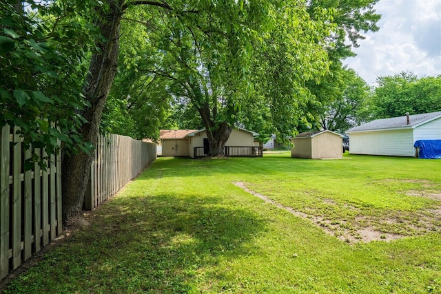 112 NW Adams St N, Hopedale, IL 61747 - fenced backyard featuring a storage shed