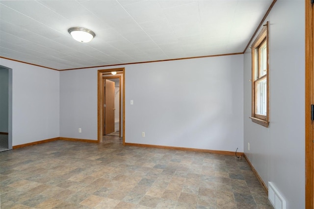 112 NW Adams St N, Hopedale, IL 61747 - spare room with stone finish flooring and ornamental molding