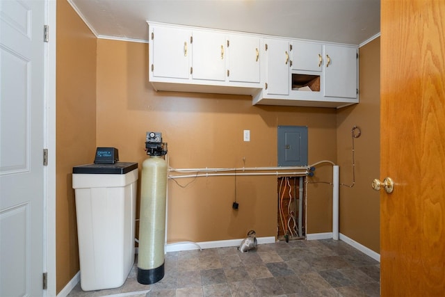112 NW Adams St N, Hopedale, IL 61747 - laundry room with electric panel, cabinet space, and crown molding