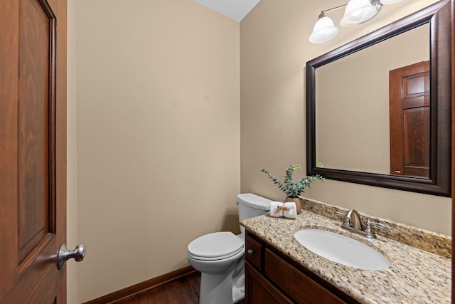 609 Spruce Ct, Oswego, IL 60543 - half bathroom featuring wood finished floors and vanity