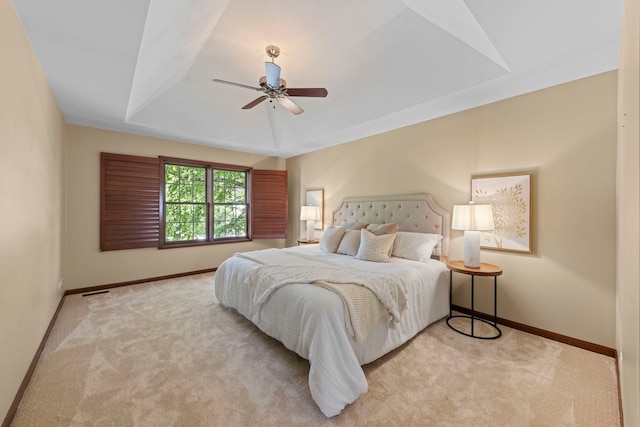 609 Spruce Ct, Oswego, IL 60543 - carpeted bedroom with a tray ceiling and ceiling fan