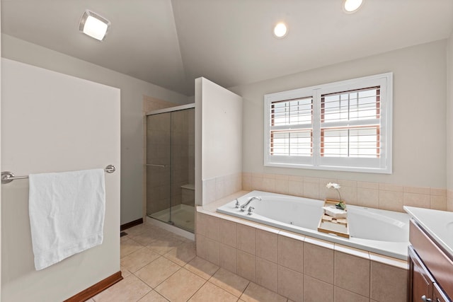 609 Spruce Ct, Oswego, IL 60543 - full bath featuring a tub with jets, a shower stall, tile patterned flooring, vanity, and lofted ceiling