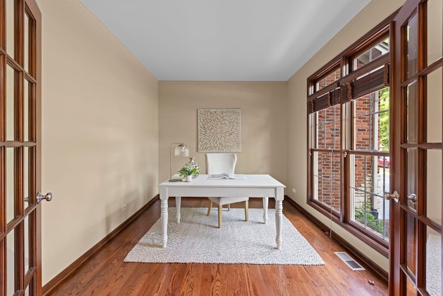 609 Spruce Ct, Oswego, IL 60543 - office featuring wood finished floors and healthy amount of natural light