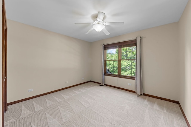 609 Spruce Ct, Oswego, IL 60543 - unfurnished room with light carpet and ceiling fan