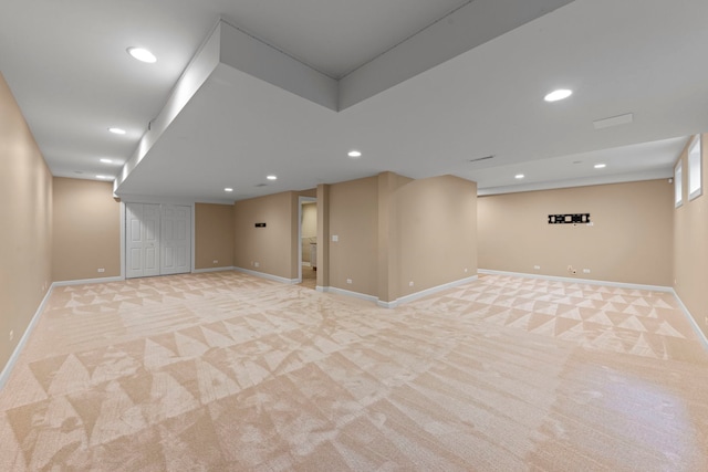 609 Spruce Ct, Oswego, IL 60543 - finished below grade area with light carpet and recessed lighting