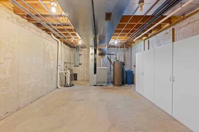 609 Spruce Ct, Oswego, IL 60543 - unfinished below grade area with heating unit, a water softener, and electric panel