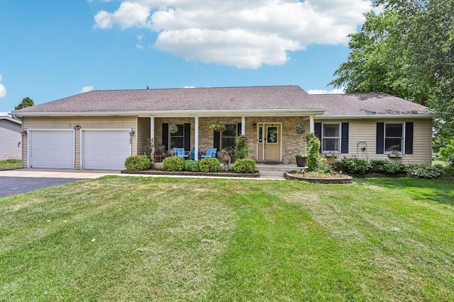 6180 Elm St, Union, IL 60180 - single story home featuring covered porch, asphalt driveway, an attached garage, and a front yard