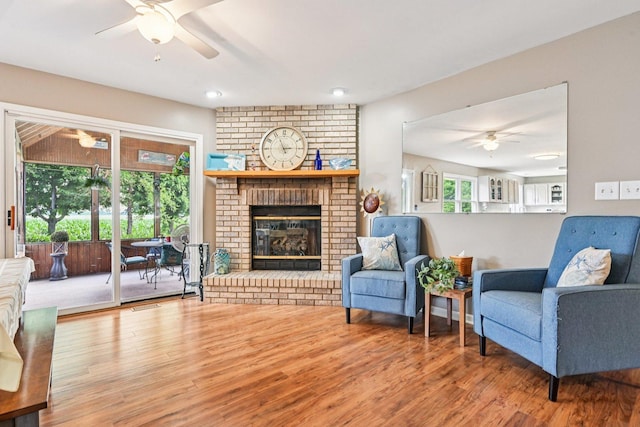 6180 Elm St, Union, IL 60180 - living room featuring ceiling fan, wood finished floors, and a fireplace