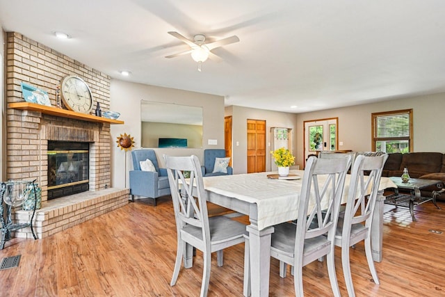 6180 Elm St, Union, IL 60180 - dining room with ceiling fan, a brick fireplace, wood finished floors, and recessed lighting