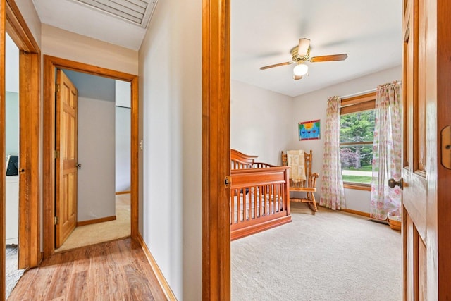 6180 Elm St, Union, IL 60180 - carpeted bedroom with wood finished floors and ceiling fan