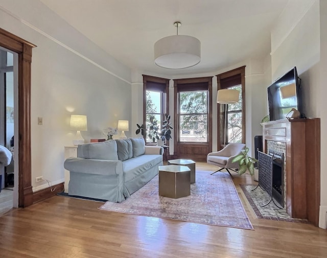 2680 N Burling St Unit 3S, Chicago, IL 60614 - living room featuring a fireplace with flush hearth and wood finished floors