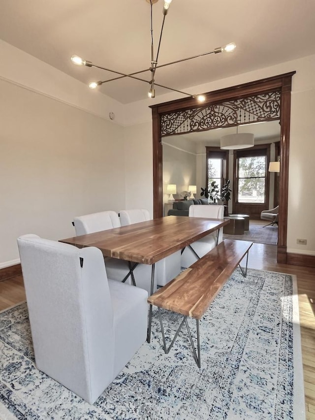 2680 N Burling St Unit 3S, Chicago, IL 60614 - dining area with wood finished floors and a chandelier
