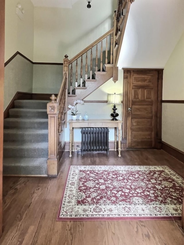 2680 N Burling St Unit 3S, Chicago, IL 60614 - stairway with radiator heating unit and wood finished floors
