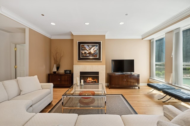 415 E N Water St Unit 806, Chicago, IL 60611 - living area featuring wood finished floors, crown molding, recessed lighting, and a lit fireplace