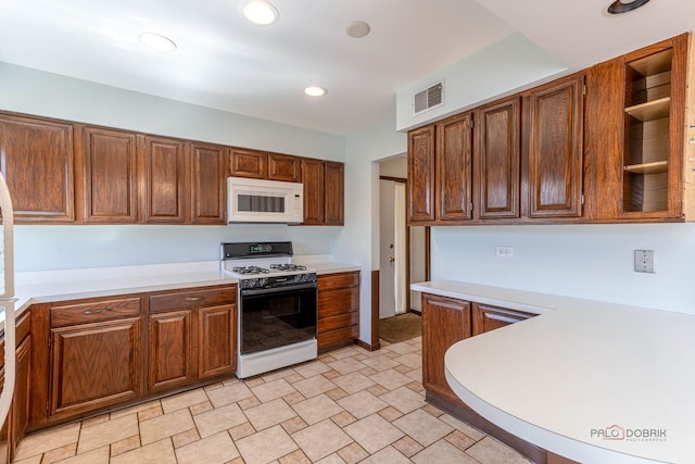 321 E Forest Knoll Dr, Palatine, IL 60074 - kitchen with white appliances, light countertops, recessed lighting, and brown cabinetry