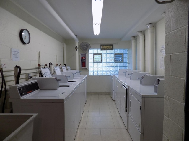1025 S Fernandez Ave Unit 3M, Arlington Heights, IL 60005 - communal laundry room featuring independent washer and dryer and light tile patterned floors