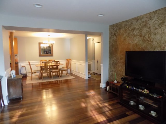 1025 S Fernandez Ave Unit 3M, Arlington Heights, IL 60005 - dining room featuring a wainscoted wall, dark wood-style floors, a chandelier, recessed lighting, and a decorative wall