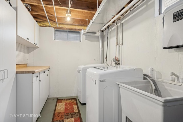 238 Weaver Dr, Cary, IL 60013 - washroom featuring washing machine and clothes dryer and cabinet space