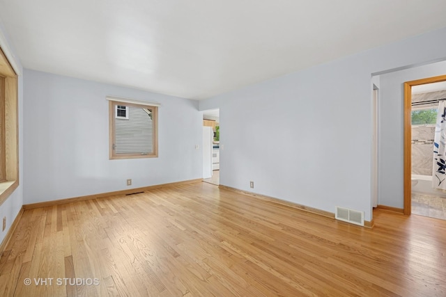 238 Weaver Dr, Cary, IL 60013 - unfurnished room featuring light wood-style flooring and baseboards