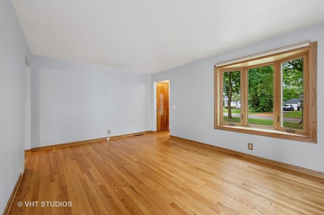 238 Weaver Dr, Cary, IL 60013 - empty room with light wood-style floors