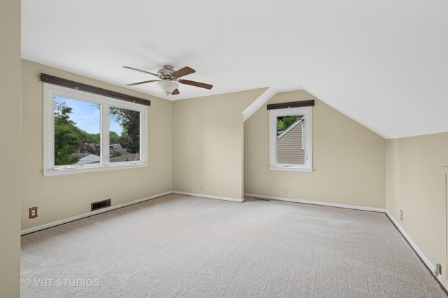 238 Weaver Dr, Cary, IL 60013 - additional living space featuring healthy amount of natural light, a ceiling fan, carpet, and lofted ceiling