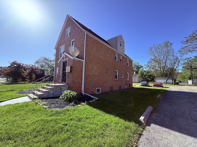 1827 170th St, Hazel Crest, IL 60429 - view of side of property with brick siding and a yard