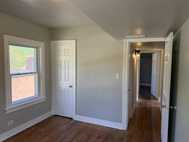 1827 170th St, Hazel Crest, IL 60429 - unfurnished bedroom with dark wood-style floors and baseboards