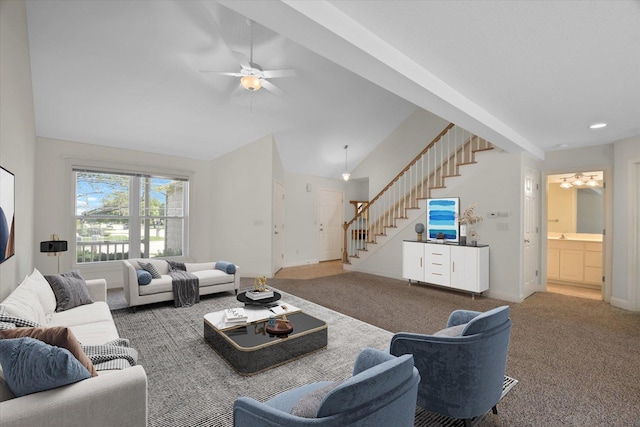 1707 Lydia Ct, Urbana, IL 61802 - carpeted living area with stairs, vaulted ceiling, and a ceiling fan