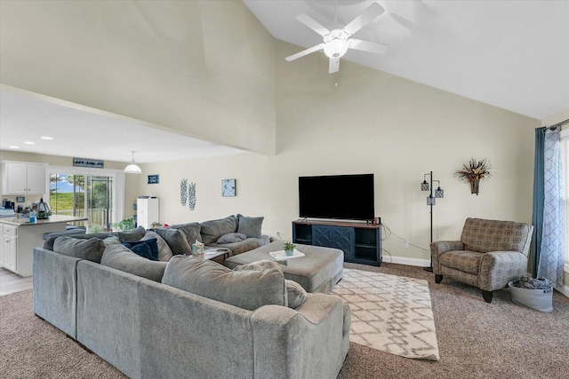 1707 Lydia Ct, Urbana, IL 61802 - living area with light carpet, high vaulted ceiling, and a ceiling fan