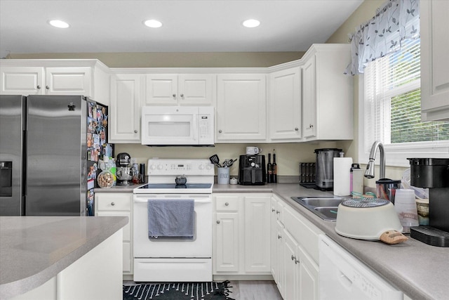 1707 Lydia Ct, Urbana, IL 61802 - kitchen featuring white appliances, white cabinets, recessed lighting, and light countertops