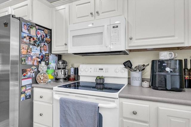 1707 Lydia Ct, Urbana, IL 61802 - kitchen with white appliances, light countertops, and white cabinets
