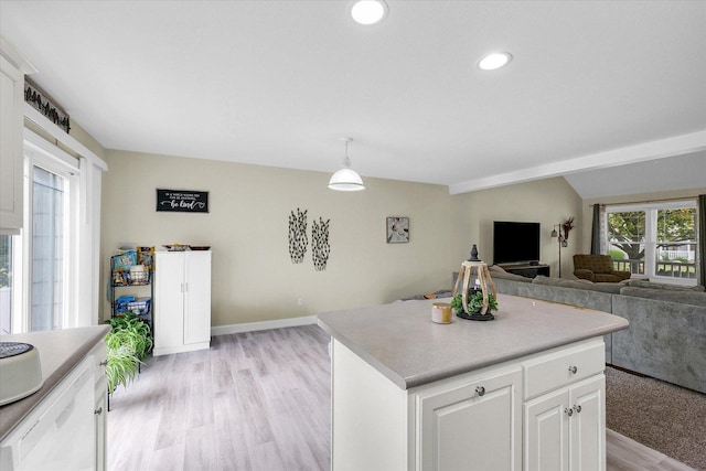 1707 Lydia Ct, Urbana, IL 61802 - kitchen featuring light wood-type flooring, light countertops, white cabinetry, open floor plan, and recessed lighting