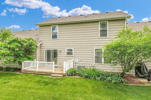 1707 Lydia Ct, Urbana, IL 61802 - rear view of property with a wooden deck, a yard, and a shingled roof
