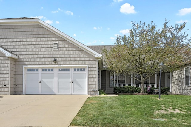 1707 Lydia Ct, Urbana, IL 61802 - ranch-style home featuring driveway, a front lawn, and an attached garage
