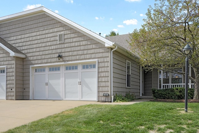 1707 Lydia Ct, Urbana, IL 61802 - view of front of property featuring an attached garage, a front yard, driveway, and a shingled roof