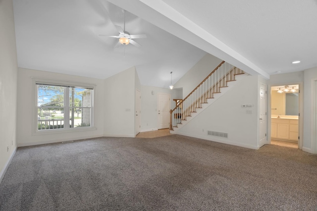 1707 Lydia Ct, Urbana, IL 61802 - unfurnished living room featuring stairway, a ceiling fan, vaulted ceiling, and carpet flooring
