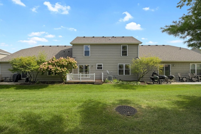 1707 Lydia Ct, Urbana, IL 61802 - back of house with a patio, a lawn, and a deck