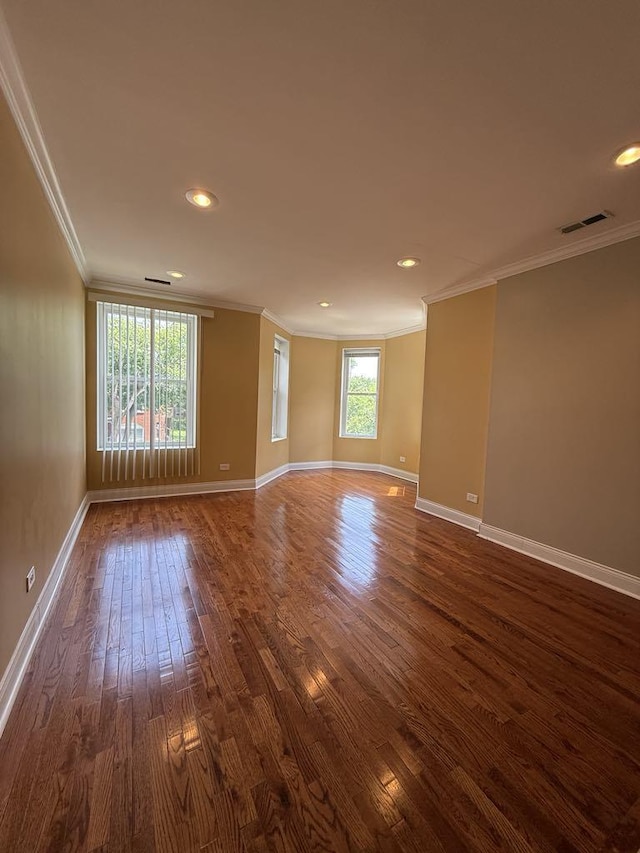 5632 S Peoria St, Chicago, IL 60621 - empty room featuring crown molding, dark wood-type flooring, and recessed lighting