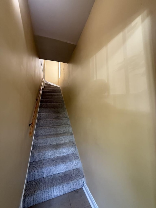 5632 S Peoria St, Chicago, IL 60621 - staircase with baseboards and tile patterned floors