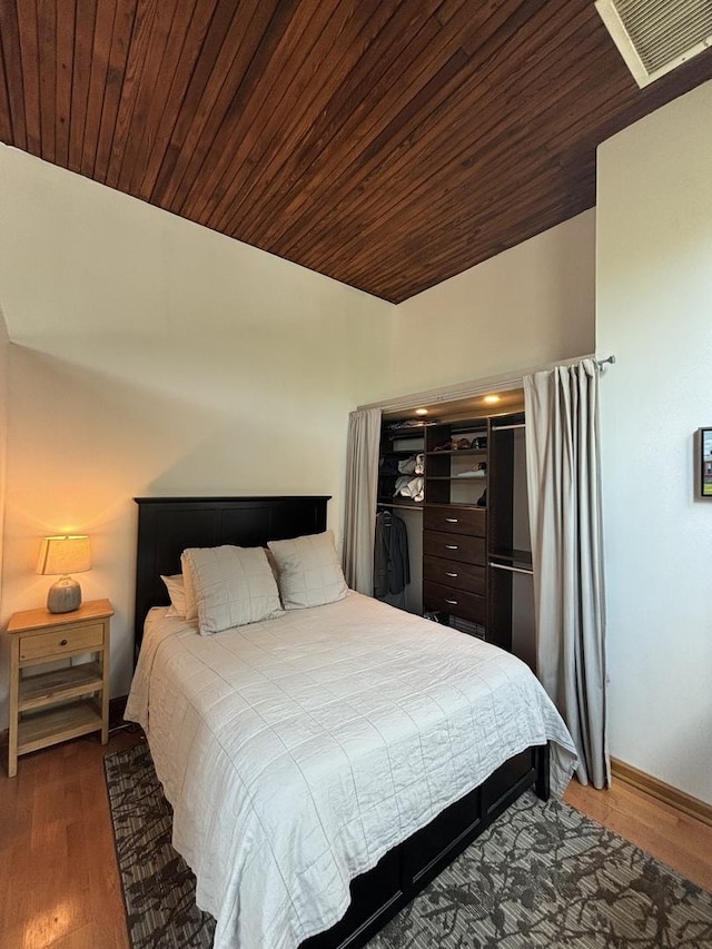 2510 N Wayne Ave Unit 203, Chicago, IL 60614 - bedroom featuring vaulted ceiling, wood finished floors, and wooden ceiling