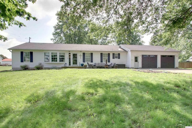 701 Dudley St, Liberty, IL 62347 - ranch-style house featuring an attached garage, outdoor lounge area, a front lawn, and concrete driveway