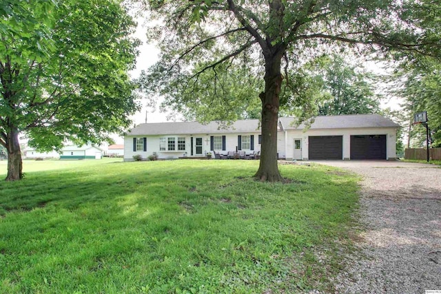 701 Dudley St, Liberty, IL 62347 - single story home with driveway and a garage