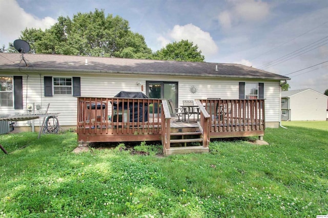 701 Dudley St, Liberty, IL 62347 - back of property with a lawn and a deck
