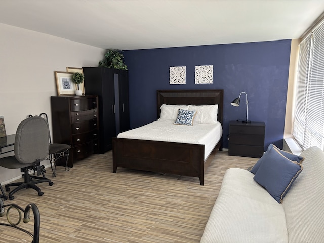 1450 E 55th Pl Unit 927S, Chicago, IL 60615 - bedroom with light wood finished floors