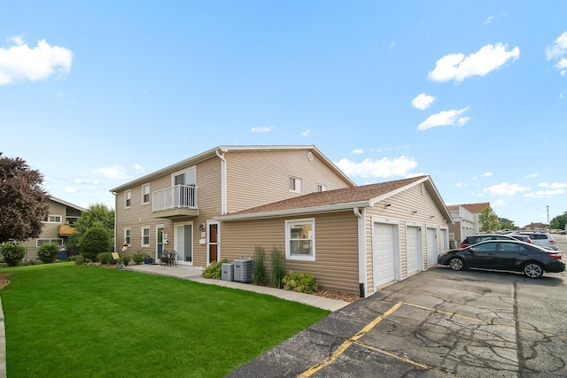7927 164th Pl Unit 236, Tinley Park, IL 60477 - view of front of property with a balcony and a front lawn